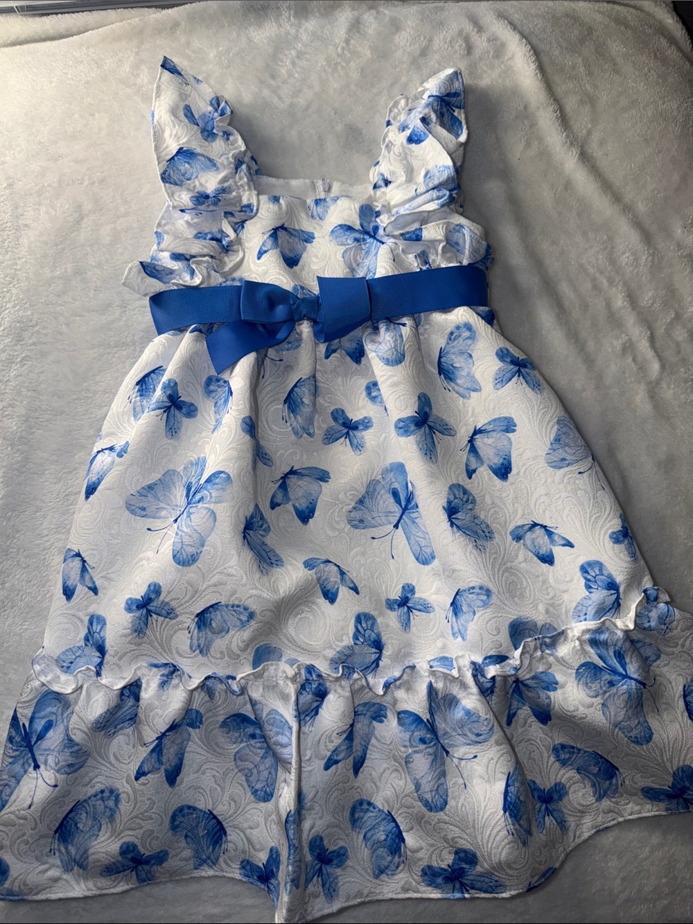 Bonnie Jean White Dress with Blue Butterfly Print and Royal Blue Bow